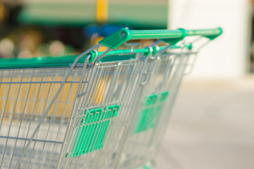 Two shopping cart on parking lot near supermarket © Joshhh