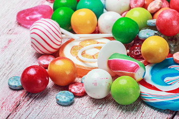 Obraz na płótnie Canvas multicolored lollipops and candy