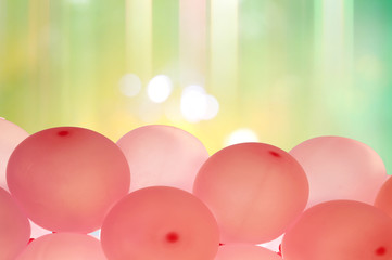 pink balloons on colorful background