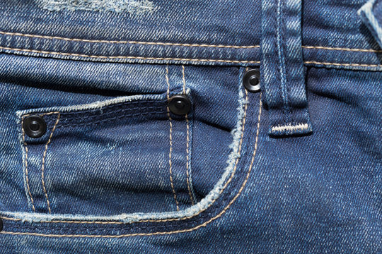 blue denim jeans pocket with design torn