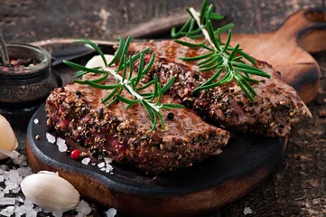  Juicy steak medium rare beef with spices © timolina