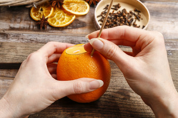How to make orange pomander ball with candle - step by step