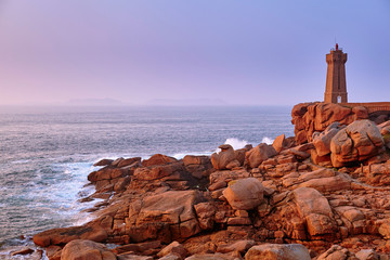 Scenic view of pink granite coast at sunset - obrazy, fototapety, plakaty