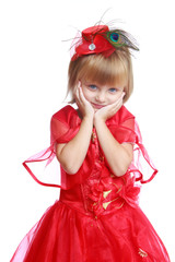 Little girl in a red ball gown.