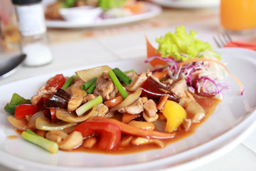 stir fried chicken with vegetables served on plate