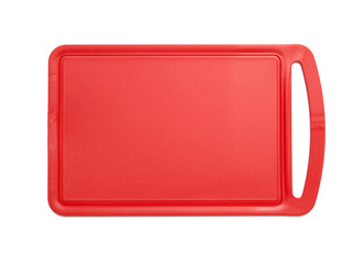 Red plastic cutting board isolated on white - 73965469