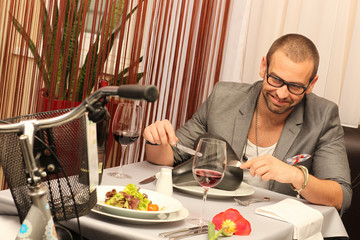 young man enjoying meal