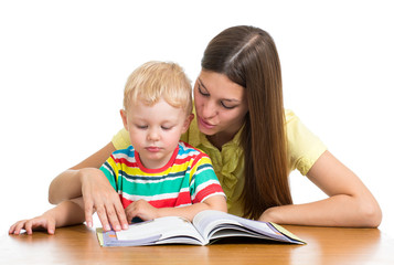 Fototapeta na wymiar mother teaches reading book to kid