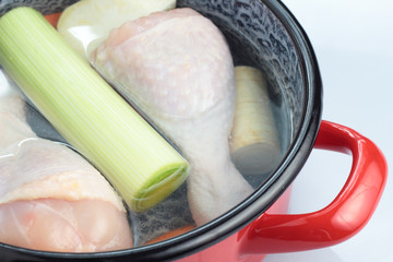 Pot of broth ingredients.