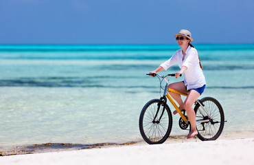 Young woman biking
