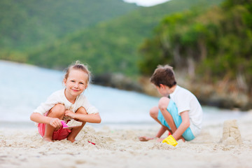 Two kids playing at beach