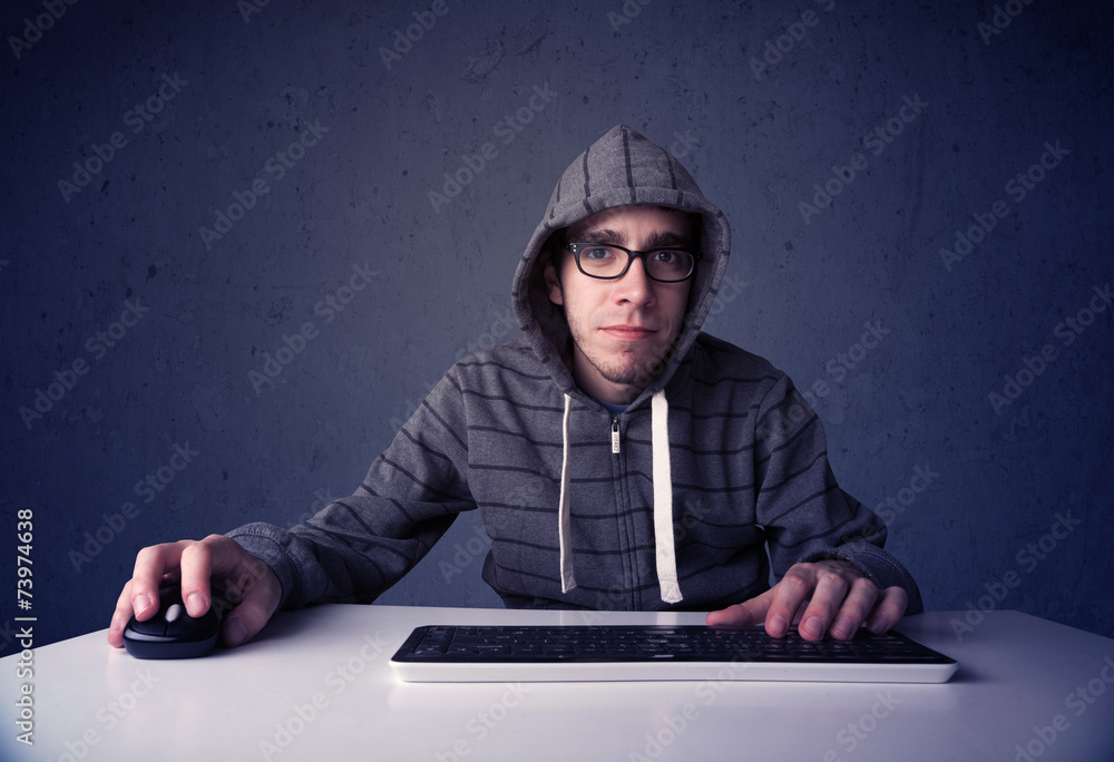 Fototapete hacker working with keyboard on blue background