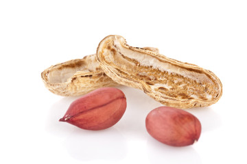 peanuts cracked open isolated on a white background