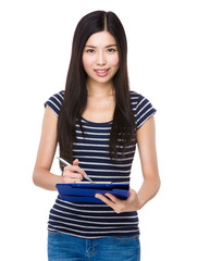 Fototapeta premium Woman take note on clipboard