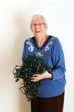 Senior Mad At Tangled Christmas Lights