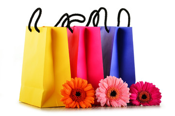 Colorful paper shopping bags isolated on white