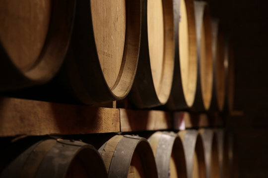 Fototapeta  Oak Wooden barrels texture closeup. Wine Beer Whiskey barrel close-up. Alcohol in barrels