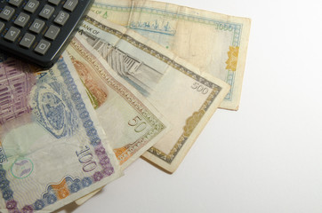 Calculator on Syrian pound background