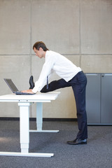 office occupational disease prevention - business man exercising