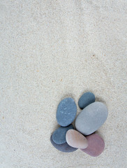 Fototapeta na wymiar pebbles on sand