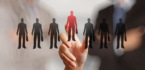 businessman hand choosing people icon as human resources concept