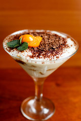 tiramisu decorated by physalis in transparent glass