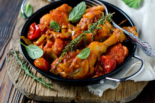 Chicken in tomato sauce with rosemary and thyme