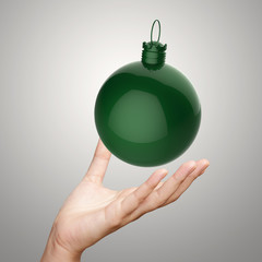 hand showing Empty Christmas ornament