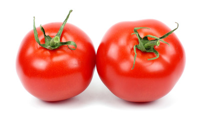 Two fresh red tomato isolated on white
