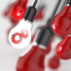 Naklejka premium light bulb with gears as leadership concept