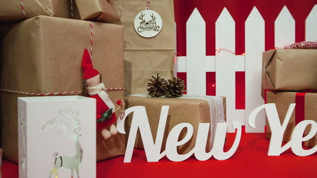 Christmas composition with gifts on the text: "New Year"