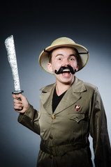Man in safari hat in hunting concept