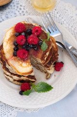 Pancakes with berries, selective focus