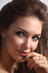 Obraz premium Close up portrait of beautiful young woman face. Isolated on