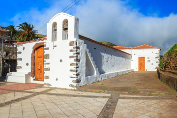 Fototapeta na wymiar Canary style white church in Arure village, La Gomera island
