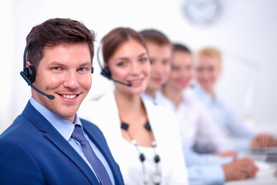 Attractive Smiling positive young businesspeople and colleagues