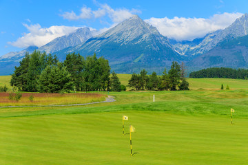 Naklejka premium Green area of a golf course in Tatra Mountains, Slovakia