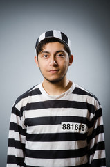 Prison inmate in funny concept