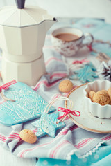 Cup of espresso and Christmas decorations on a table