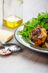 Pizza snails, minipizza with salad and parmagio