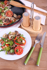 Braised wild mushrooms with vegetables and spices in pan and