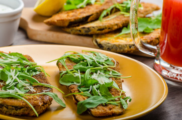 Breaded eggplant parmesan and arugula