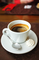 Cup of tasty coffee in cafe