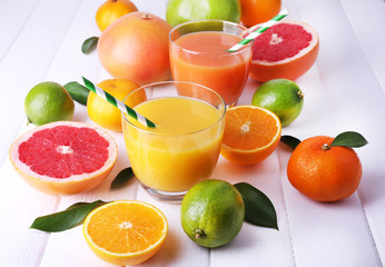 Juices and many citrus close-up