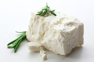 Feta cheese isolated on white © Africa Studio
