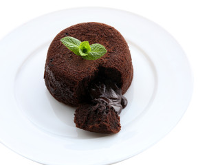 Hot chocolate pudding with fondant centre on plate, close-up