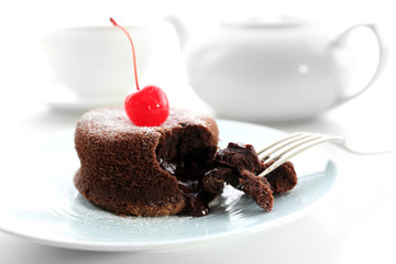 Hot chocolate pudding with fondant centre on plate, close-up