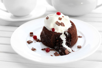 Hot chocolate pudding with fondant centre with ice-cream,