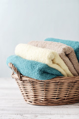 Bath towels in wicker basket
