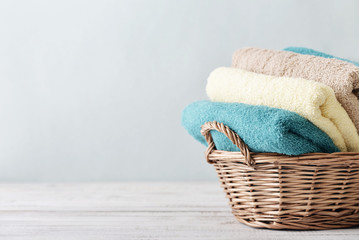  Bath towels in wicker basket
